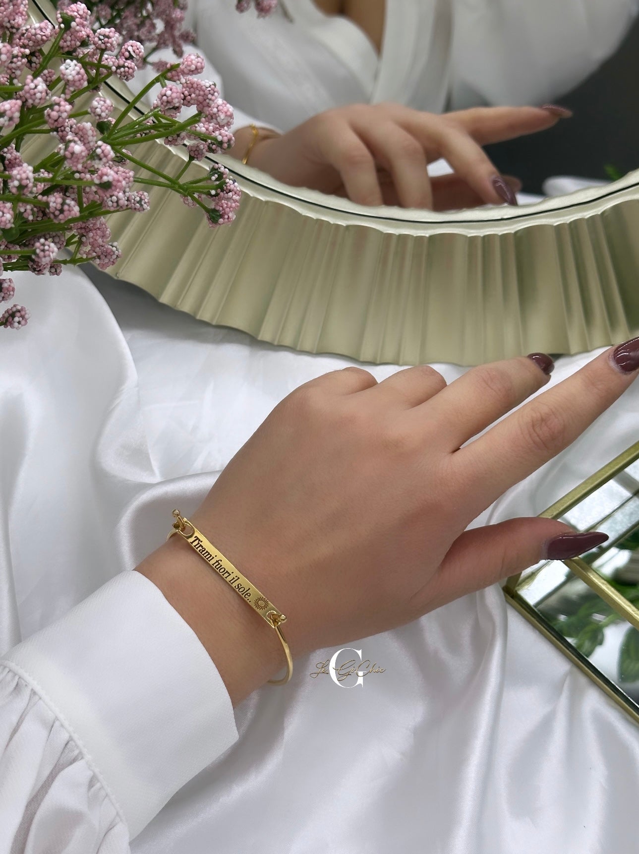 Bracciale “rigido con piastrina”