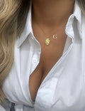 Collana “Cuore anatomico con mani”