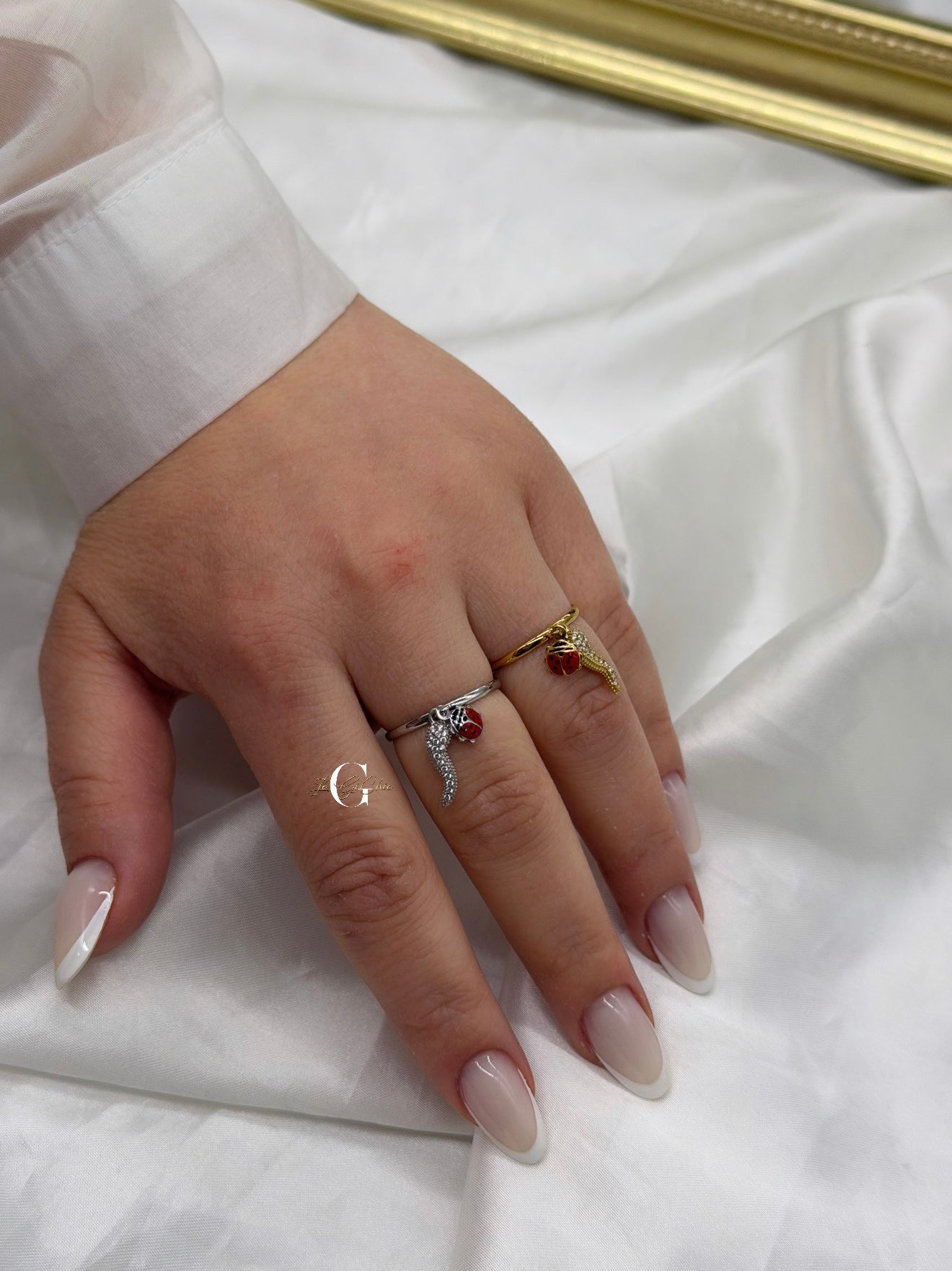 Anello “Coccinella e corno zirconato”