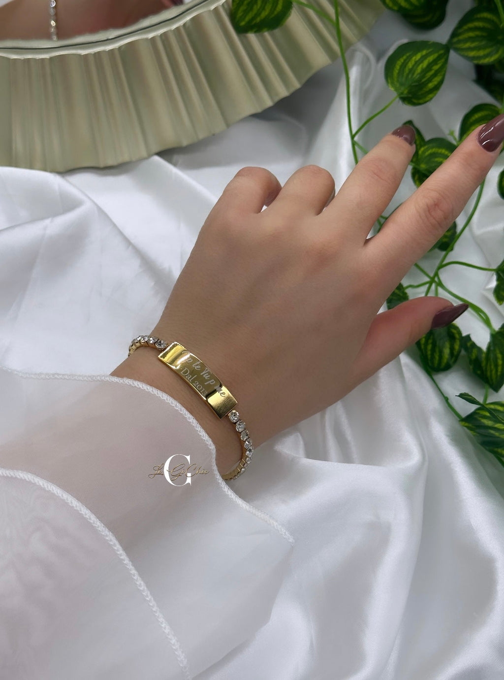 Bracciale “Tennis con piastrina”