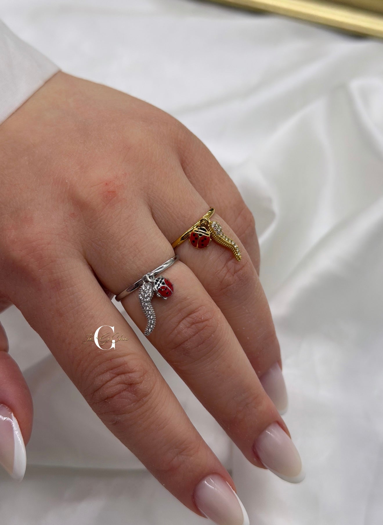 Anello “Coccinella e corno zirconato”