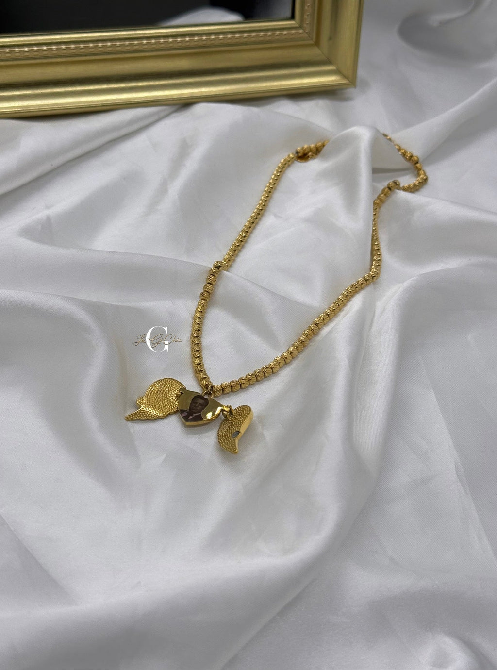 Collana “Cuore con ali d’angelo” FOTO